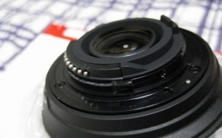 尼康相机镜头维修图纸（尼康相机镜头坏修的多少钱一个）